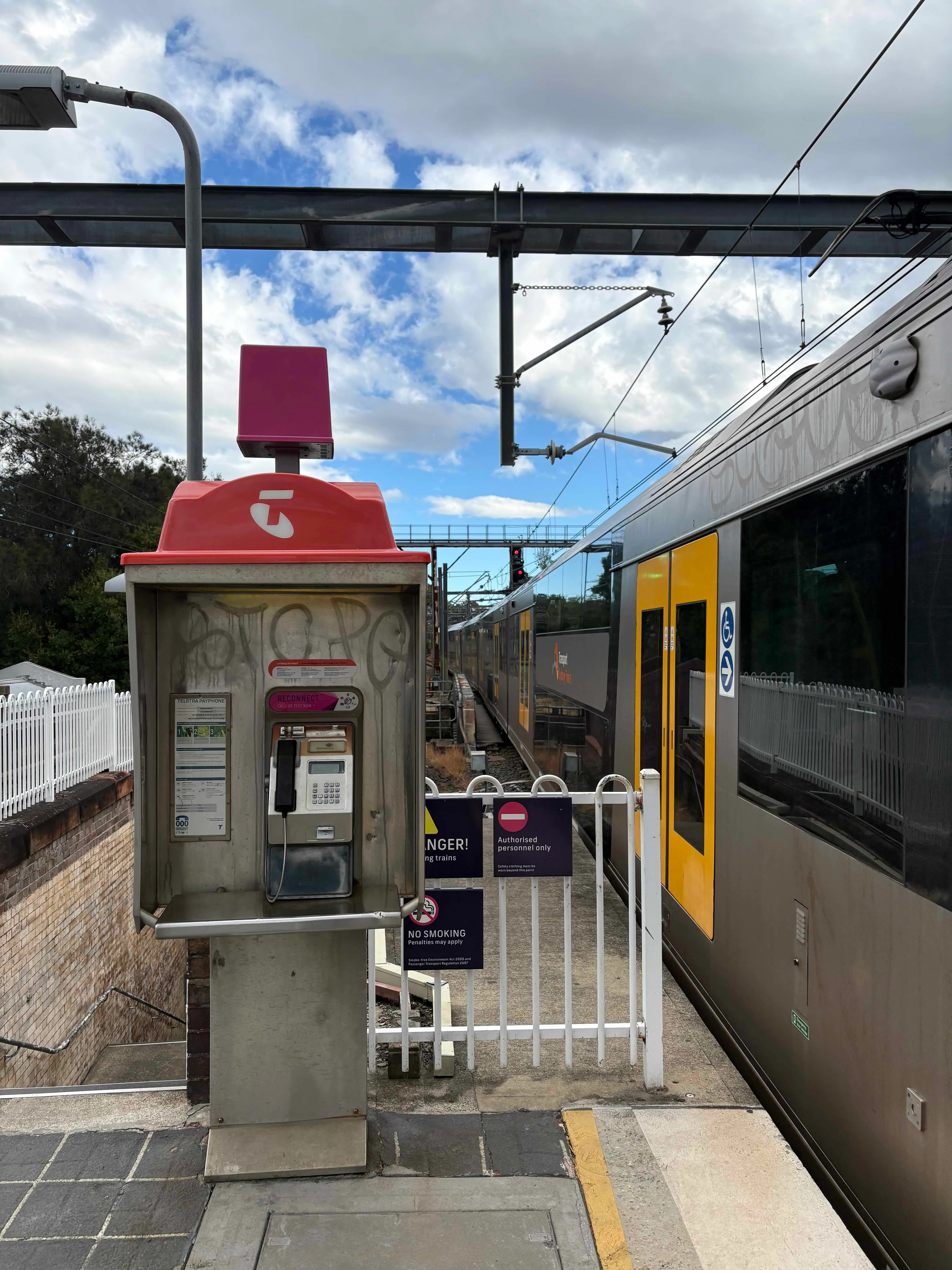 A photo of a payphone on Macdonaldtown station